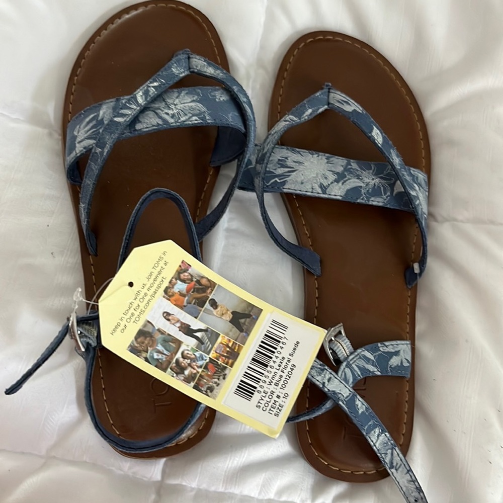 Never worn Toms sandals.